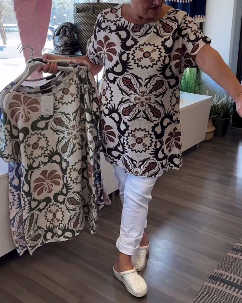 Avslappnad blommig blus med rund hals