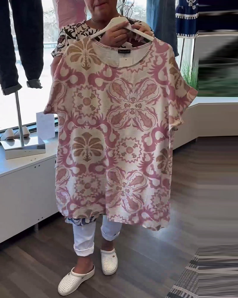 Avslappnad blommig blus med rund hals