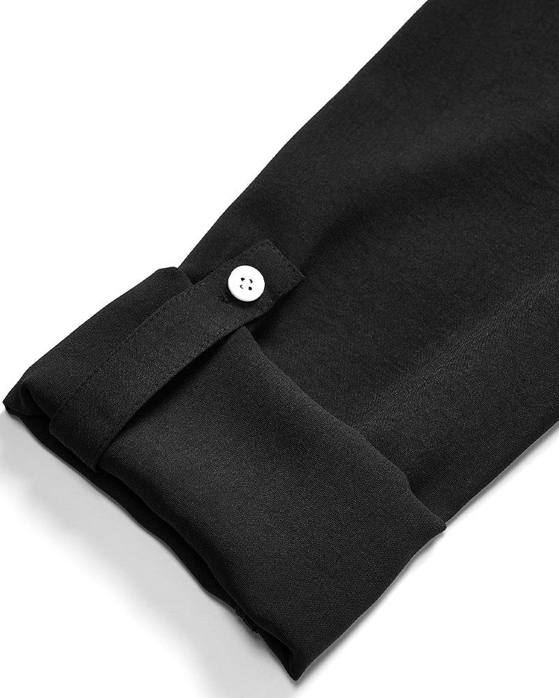 Avslappnad topp med paljettknappar med panel