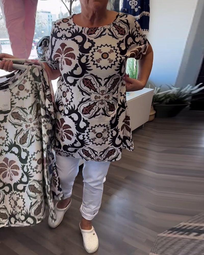 Avslappnad blommig blus med rund hals